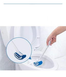 Close-up of curved toilet brush head with fiber bristles for efficient surface cleaning
