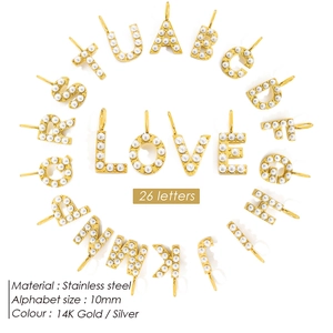 Detailed view of 26 gold pearl alphabet charms for DIY jewelry, 10mm stainless steel pendants
