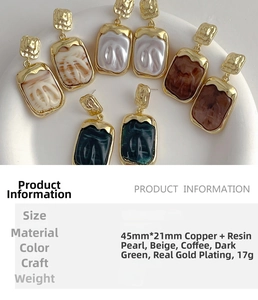 Detail showing irregular metal earrings with rectangular resin charms in four colors