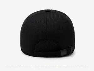 Rear view of black thermal baseball cap showing adjustable strap and textured fabric