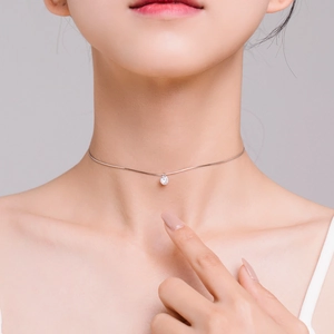 Minimalist S925 silver necklace featuring a sparkling round zircon pendant on a snake chain