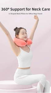 Pink memory foam U-shaped travel pillow with snap button for 360-degree neck support