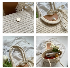 Detailed view of cream cotton woven tote featuring lace bow and pearl accent detail