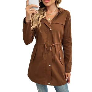 Detail of brown hooded windbreaker showing adjustable drawstring waist and metal snap buttons