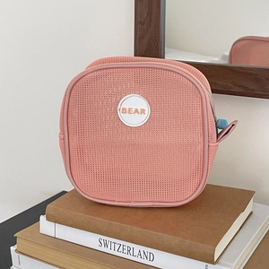 Pink mesh makeup bag with blue zipper pull and BEAR logo, portable travel toiletry pouch