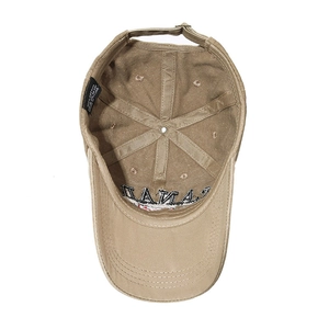 Khaki cotton baseball cap featuring embroidered Canada text and detailed interior stitching