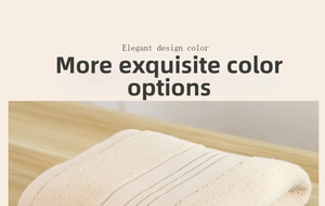 Detailed close-up of thick cream cotton bath towel with soft loops and striped edge