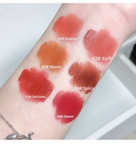 Arm swatches of six matte lip clay shades from apricot to deep brick red colors