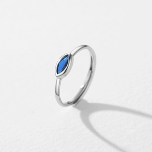 Minimalist S925 sterling silver open ring featuring a blue marquise-cut evil eye stone