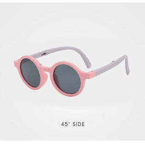 Detail view of pink round frame kids sunglasses with flexible purple temples at 45 degree