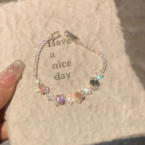 Sparkling silver tennis bracelet with colorful heart and oval gemstones with micro zircons
