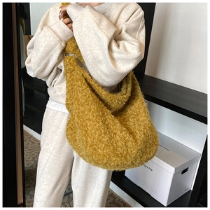Detail of soft yellow plush texture on this oversized hobo shoulder tote bag