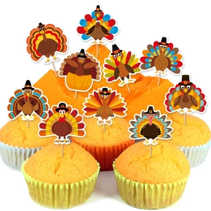 Detailed view of 10 different cartoon turkey cupcake toppers for Thanksgiving party decor