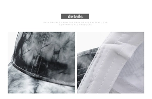 Detail of baseball cap with black and white tie-dye pattern and double-stitch texture