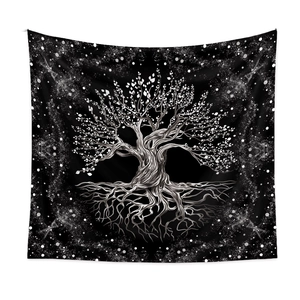Detail showing the intricate black and white Tree of Life design on decorative tapestry