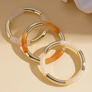 Three-piece acrylic and gold metal elastic bracelets with bamboo-style segment textures