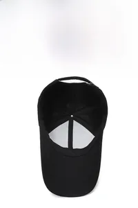 Detail view of the black mesh lining and adjustable metal buckle on this baseball cap