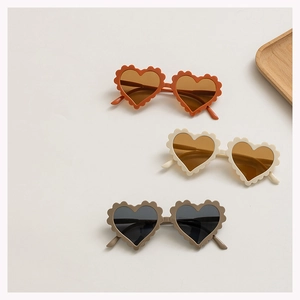 Kids heart shaped sunglasses with petal wave frames in assorted stylish colors