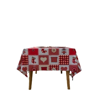 Classic red and white checkered Christmas tablecloth with festive cartoon holiday patterns