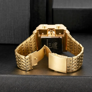 Detail view of the stainless steel back case and folding clasp of the golden quartz watch