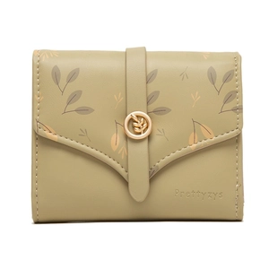 Close-up of green tri-fold PU leather wallet with vintage leaf print and gold buckle