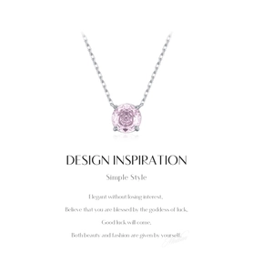 Detail of rose-cut pink gemstone pendant with four-prong setting on S925 silver chain