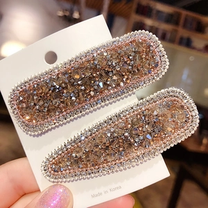 Ins style sparkling crystal hair clips set in champagne rhinestones on white card