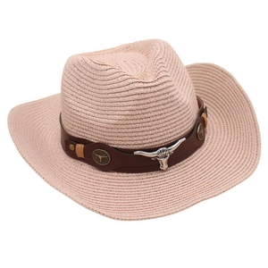 Close-up of pink woven cowboy hat featuring a leather band with bull head metal emblem