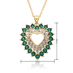 Detail view of heart pendant with green and clear zircons and 25mm by 28mm dimensions