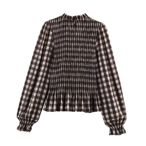 Flat lay of black and white gingham shirt with high neck and smocked details