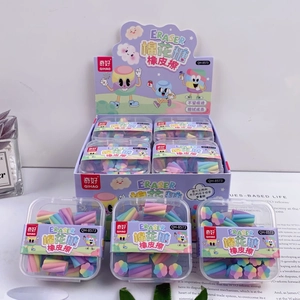 Close-up of marshmallow-shaped colorful erasers in individual transparent packaging boxes