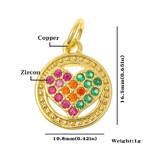 Macro detail of copper heart charm with zircon inlay including dimensions 16.5mm x 10.8mm