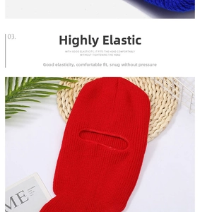 Detailed knit texture of red single-hole balaclava mask on flat lay background