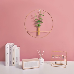 Nordic gold iron wall-mounted circular flower vase with realistic green plant decor