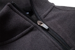 Detail of high-density knit fabric and smooth metal zipper on this stylish fleece hoodie