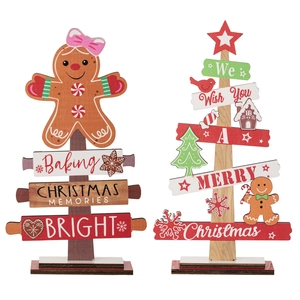 Christmas gingerbread man and tree wooden desktop decorations with holiday greetings