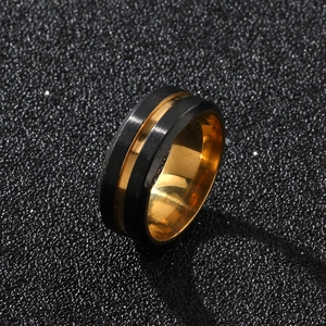 Men's 8mm titanium steel ring featuring black brushed finish and gold central groove detail
