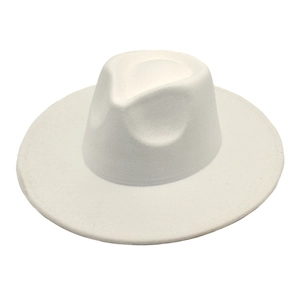 Close-up of a premium white wool fedora with a teardrop crown and flat wide brim