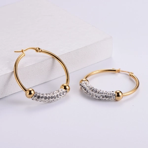 Elegant gold hoop earrings with multi-row sparkling zircon crystals and hinged clasp