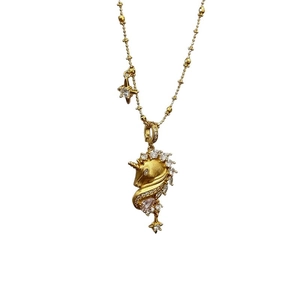 18k gold plated unicorn pendant necklace with sparkling cubic zirconia on a white background