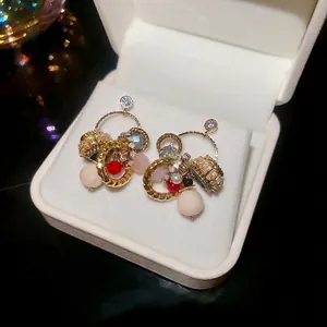 Elegant vintage style gold hoop earrings with colorful zircon beads and crystals