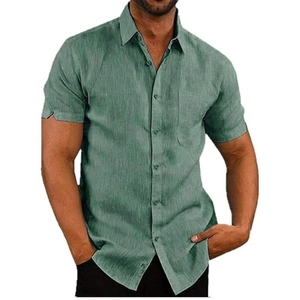 Detail of retro green linen short sleeve shirt featuring front pocket and button closure