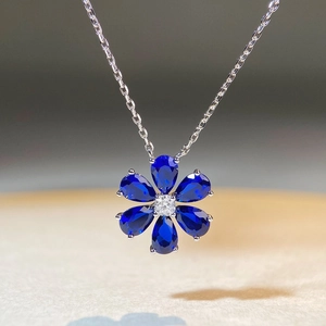 Elegant S925 silver necklace with blue sapphire flower pendant and pear-cut petals