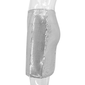 Detail shot of shimmering silver square sequins on a form-fitting mini party skirt