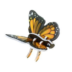 Detailed 3D paper butterfly puzzle toy showing layered orange and black wing textures