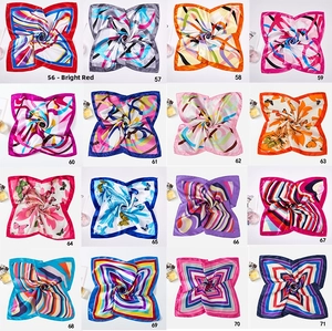 Detail showing 16 various colorful patterns of 50x50cm satin square scarves in a grid