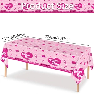 Pink disposable plastic tablecloth with hearts and fashion icons for themed birthday parties