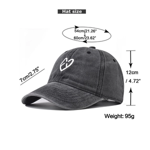 Detail view of washed cotton baseball cap with size specs and heart embroidery