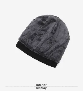 Close-up of the thick grey fleece lining inside the black knitted winter beanie
