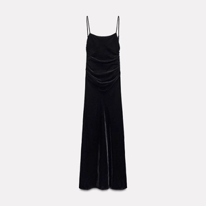 Elegant black velvet midi dress with spaghetti straps and pleated waist detail